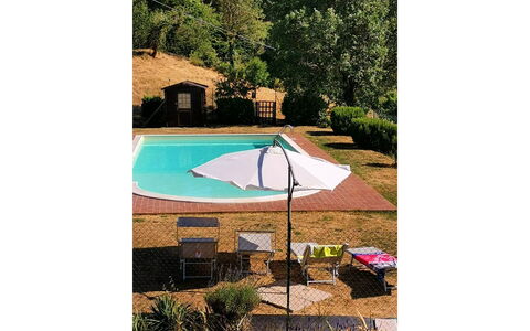 La Casa nel Borgo: Plant, Umbrella, Property, Tree, Shade, Water, Outdoor Furniture, Rectangle, Natural Landscape, House