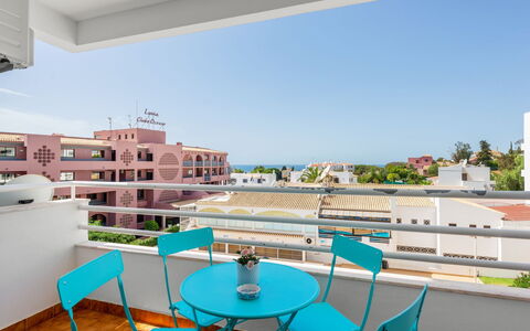 Happy Moments: Property, Furniture, Sky, Azure, Chair, Building, Interior Design, Urban Design, Shade, Condominium