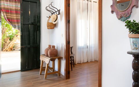 Patio de Las Granadas: Property, Plant, Door, Wood, Interior Design, Floor, Flooring, Houseplant, Hardwood, Wood Stain