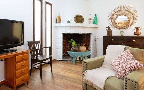 Patio de Las Granadas: Furniture, Property, Cabinetry, Plant, Couch, Table, Comfort, Picture Frame, Wood, Interior Design