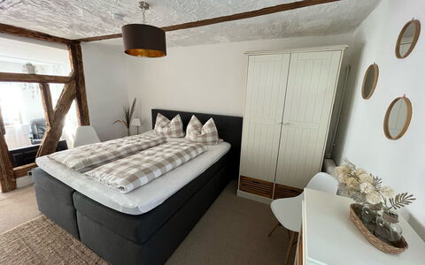 Schillerplatz: Building, Wood, Comfort, Interior Design, Floor, House, Flooring, Shade, Window, Bed Frame