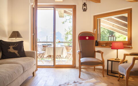 Chalet sans Soucis: Furniture, Property, Window, Building, Comfort, Wood, Shade, Textile, Interior Design, Chair