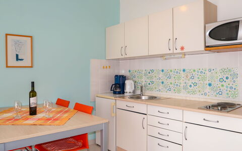 Senj 114: Cabinetry, Furniture, Property, Countertop, Table, Interior Design, Sink, Drawer, Kitchen, Flooring