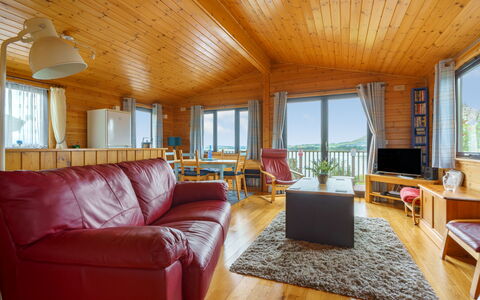 Lodge 9: Couch, Furniture, Table, Building, Comfort, Window, Wood, Interior Design, Studio Couch, Floor