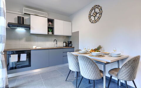 Labin 389: Interior Design, Furniture, Flooring, Ceiling, Kitchen, Countertop, Floor, Room, Lighting, Cabinetry