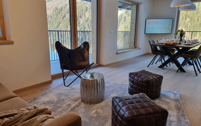 Bergschnucke Homes 335.5: Brown, Furniture, Picture Frame, Building, Chair, Wood, Couch, Window, Interior Design, Living Room