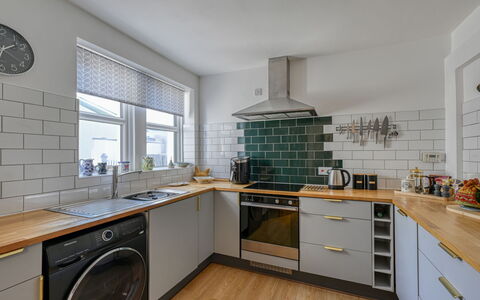 Suilven: Kitchen, Kitchen Appliance, Major Appliance, Countertop, Interior Design, Flooring, Cabinetry, Floor, Home Appliance, Ceiling