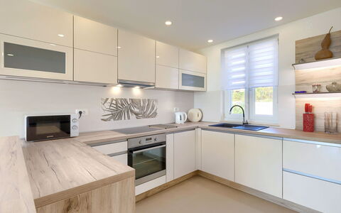 Villa Luna Maris: Furniture, Property, Picture Frame, Azure, Wood, Lighting, Interior Design, Comfort, Floor, Flooring