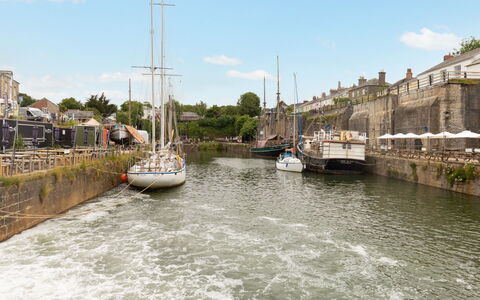 The Saltings: Water, Cloud, Sky, Boat, Watercraft, Water Resources, Building, Watercourse, Bank, Lake