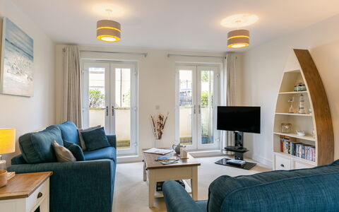 The Saltings: Furniture, Couch, Property, Table, Comfort, Interior Design, Living Room, Floor, Window, Studio Couch