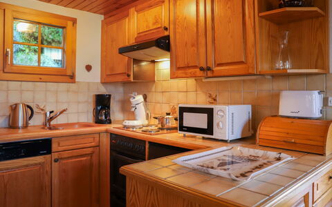 Ushuaia: Cabinetry, Countertop, Property, Furniture, Kitchen Sink, Kitchen Appliance, Wood, Kitchen, Home Appliance, Sink