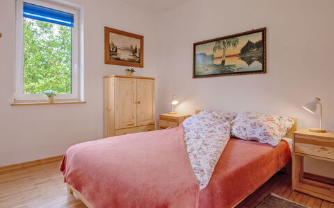 Zagroda Nad Krutynią: Bed, Bedroom, Bedding, Furniture, Bed Sheet, Interior Design, Wood, Room, Linens, Floor