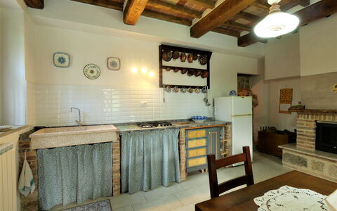 Turi: Property, Cabinetry, Wood, Interior Design, Kitchen, Table, Shelf, Floor, Flooring, Building