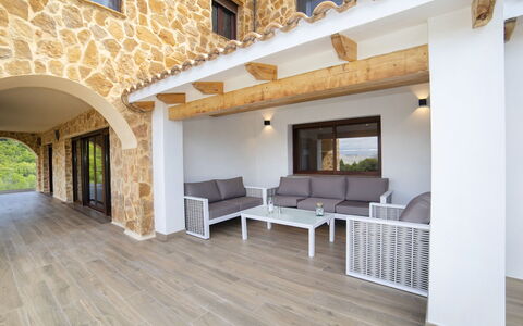 Mucho: Property, Window, Building, Wood, Interior Design, Shade, Floor, Flooring, Living Room, Couch