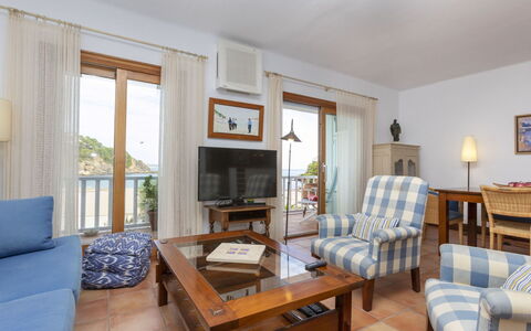 Sa Riera Beach: Picture Frame, Couch, Furniture, Table, Blue, Wood, Interior Design, Building, Lamp, Comfort