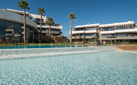 Calma Blanca: Sky, Water, Daytime, Building, Azure, Body Of Water, Architecture, Tree, Urban Design, Public Space
