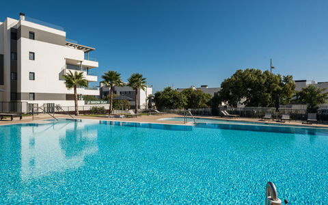 Calma Blanca: Water, Sky, Plant, Daytime, Swimming Pool, Building, Blue, Tree, Outdoor Furniture, Leisure