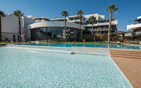 Calma Blanca: Sky, Water, Building, Azure, Plant, Swimming Pool, Tree, Leisure, Aqua, Arecales