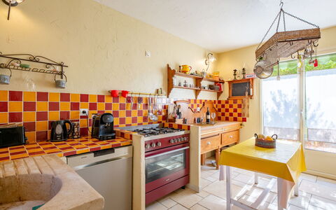 Reves de Rives: Building, Cabinetry, Countertop, Wood, House, Lighting, Kitchen, Orange, Window, Interior Design
