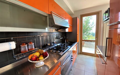 Casa Chiara: Cabinetry, Food, Countertop, Kitchen Appliance, Kitchen Stove, Gas Stove, Kitchen, Home Appliance, Orange, Wood