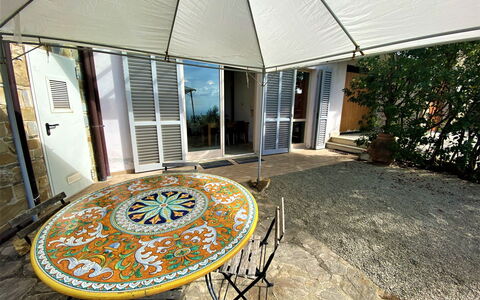 Casa Chiara: Furniture, Property, Table, Chair, Building, Plant, Shade, Wood, Outdoor Furniture, Flooring
