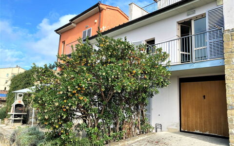 Casa Chiara: Plant, Cloud, Flower, Building, Property, Sky, Window, House, Road Surface