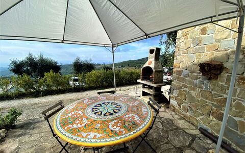 Casa Chiara: Plant, Building, Property, Table, House, Shade, Tree, Umbrella, Architecture, Chair