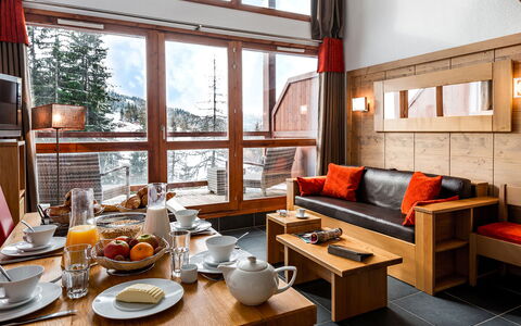 Bourg St Maurice 651: Table, Furniture, Property, Couch, Wood, Tableware, Orange, Interior Design, Window, Lighting