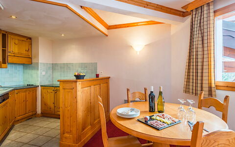La Plagne 647: Table, Furniture, Cabinetry, Property, Wood, Bottle, Countertop, Building, Chair, Interior Design