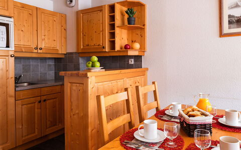 Valloire 651: Cabinetry, Property, Furniture, Table, Tableware, Dishware, Coffee Cup, Cup, Drawer, Interior Design