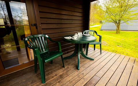 Geli: Furniture, Table, Plant, Building, Wood, Shade, Tree, Lighting, Interior Design, Outdoor Furniture