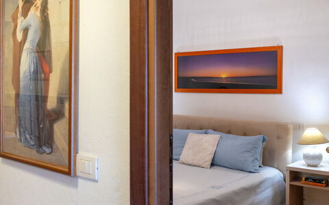 Robby: Wall, Interior Design, Furniture, Bed, Wood, Bedroom, Floor, Room, Flooring, Picture Frame