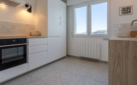 Les Mouettes: Cabinetry, Countertop, Building, Window, Kitchen, Lighting, Wood, Kitchen Appliance, Flooring, Interior Design