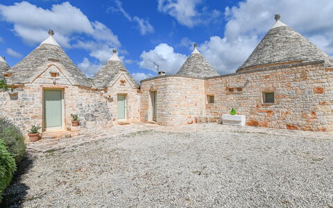 Trullo Ulivo: Cloud, Sky, Plant, Building, Window, Landscape, House, Grass, Facade, Stone Wall