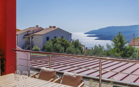 Flores: Sky, Building, Furniture, Property, Water, Wood, Shade, Chair, Outdoor Furniture, Cottage