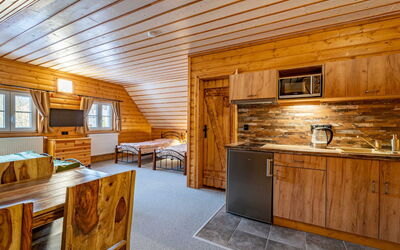 Chalupa U Bobra 55.1: Cabinetry, Furniture, Countertop, Property, Kitchen, Wood, Drawer, Lighting, Interior Design, Wood Stain
