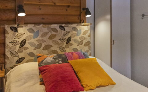 Kirnutie 3: Bed, Interior Design, Bedroom, Bed Sheet, Bedding, Wall, Furniture, Wood, Linens, Yellow