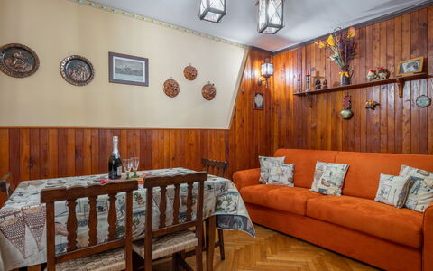 Hedelweiss House: Furniture, Property, Table, Picture Frame, Couch, Wood, Interior Design, Lighting, Floor, Studio Couch