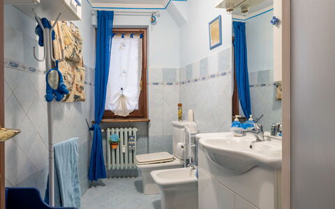 Hedelweiss House: Mirror, Property, Photograph, Tap, Sink, Plumbing Fixture, Blue, Purple, Azure, Bathroom