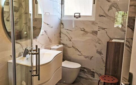Hibiscus: Interior Design, Flooring, Floor, Plumbing Fixture, Plumbing, Bathroom, Toilet, Ceiling, Tile, Room