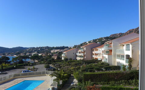 Les Coraux: Sky, Plant, Property, Building, Blue, Water, Window, Azure, Swimming Pool, Urban Design