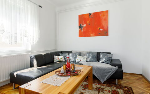 Pioneer: Couch, Table, Property, Furniture, Comfort, Building, Wood, Orange, Textile, Interior Design