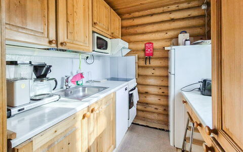 Munkero: Wood, Kitchen, Major Appliance, Sink, Countertop, Kitchen Appliance, Wood Stain, Tap, Log Cabin, Plumbing Fixture