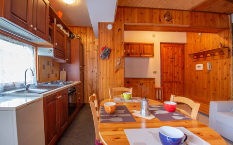 La Collina: Cabinetry, Property, Furniture, Table, Wood, Kitchen, Orange, Tableware, Interior Design, Chair