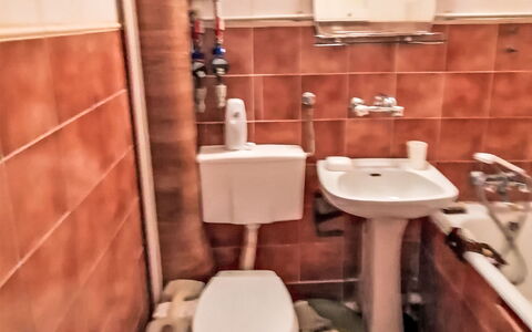Kasprzaka Warszawa: Toilet Seat, Bathroom, Plumbing Fixture, Toilet, Bathroom Sink, Sink, Flooring, Floor, Plumbing, Tap
