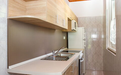 Marie: Table, Furniture, Property, Wood, Interior Design, Lighting, Couch, Architecture, Flooring, Living Room