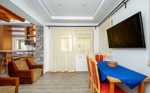 Violette: Table, Furniture, Property, Wood, Interior Design, Lighting, Couch, Architecture, Flooring, Living Room