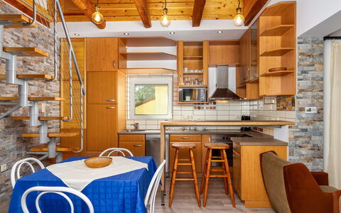 Violette: Table, Furniture, Property, Wood, Interior Design, Lighting, Couch, Architecture, Flooring, Living Room