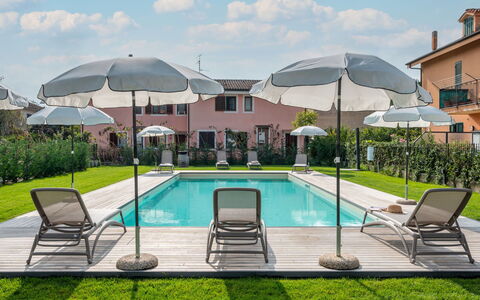 Imperia 388: Water, Plant, Cloud, Sky, Property, Furniture, Swimming Pool, Umbrella, Azure, Building