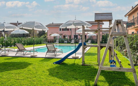 Imperia 388: Plant, Cloud, Sky, Shade, Land Lot, Leisure, Grass, Outdoor Furniture, Recreation, City